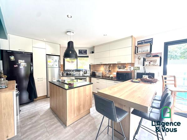 kervignac – maison contemporaine 5 chambres avec piscine, garage et grand jardin