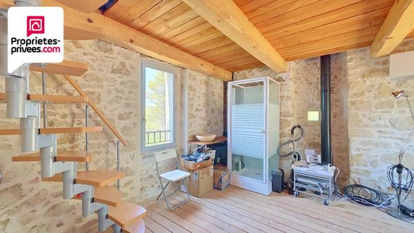 TOUR EN PIERRES AMENAGEE AVEC TERRAIN DE 7 HECTARES ET VUE PANORAMIQUE SUR LA VALLEE DE LA SIAGNE