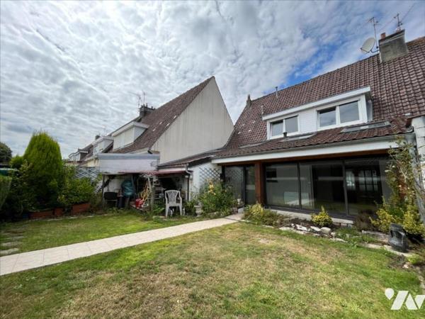 MAISON DE LOTISSEMENT avec 2 garages