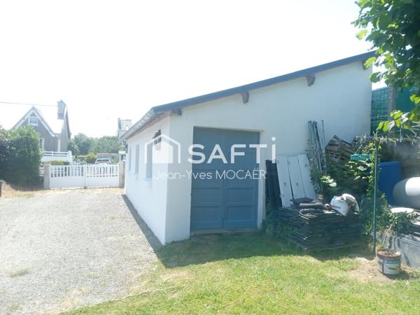 CHATEAUNEUF DU FAOU (29520), Terrain avec garage, atelier, parking privé, en centre bourg.