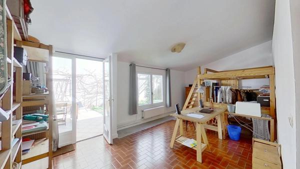 Bien rare aux portes de Paris – Appartement mixte de plein pied à usage d’habitation avec jardin privatif