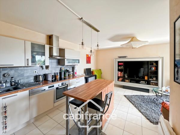 Appartement T2 44m2 avec balcon, cave et garage