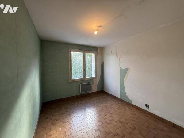 Appartement de type F2 avec garage et place de parking privative