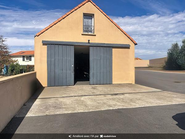 Maison de plain-pied avec dépendances et appartement locatif Le Loroux-Bottereau