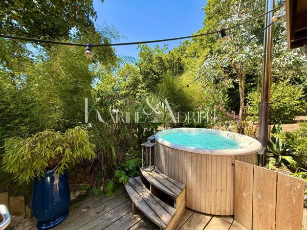 Charme et authenticité pour cette propriété en pierre avec une activité de Gîte