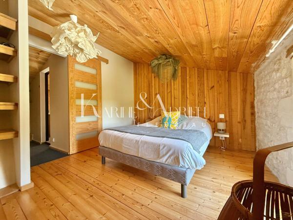 Charme et authenticité pour cette propriété en pierre avec une activité de Gîte