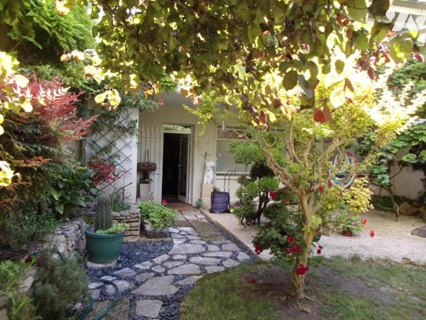 Centre-ville : 2 maisons de caractère avec jardin