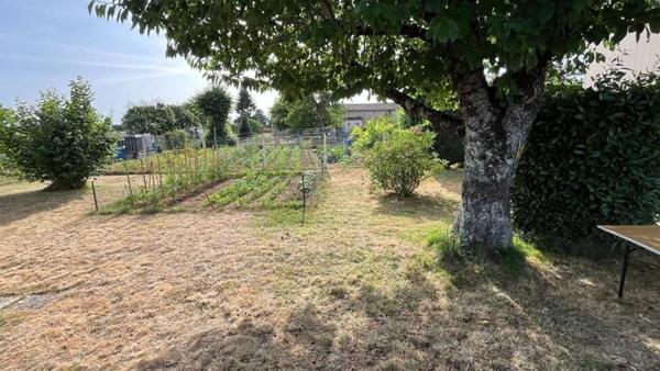 Mobil home avec assainissement, garage et jardin