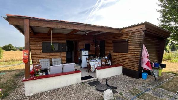 Mobil home avec assainissement, garage et jardin