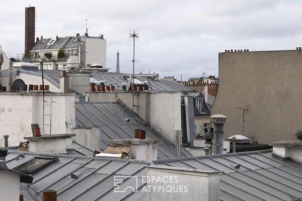 Chambre de service aménagée en studio avec vue sur Tour Eiffel