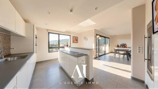 Appartement T4 de 130 m² Park Jean Monnet étage 6/7 Balcon Garage double Saint-Genis-Pouilly 01630