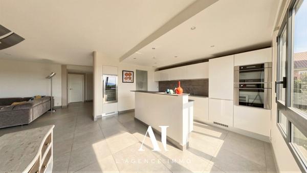 Appartement T4 de 130 m² Park Jean Monnet étage 6/7 Balcon Garage double Saint-Genis-Pouilly 01630