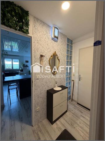 Plain pied récent à deux pas du centre ville .