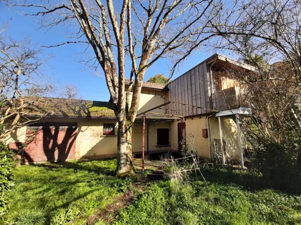 🏡 RISCLÉ – Centre-ville : Maison T4 avec garage 🚗 et superbe terrain arboré de 1 350 m² 🌳