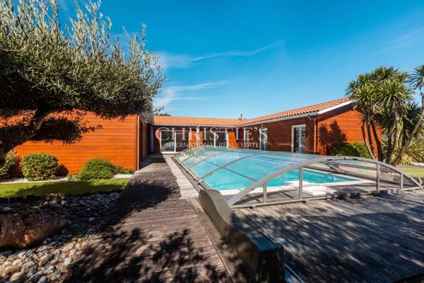 BISCARROSSE : Maison contemporaine en bois avec piscine