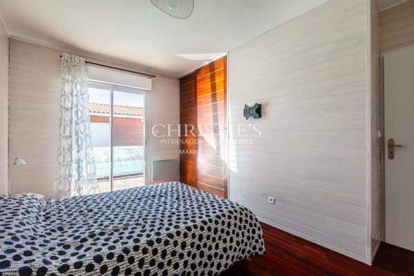 BISCARROSSE : Maison contemporaine en bois avec piscine