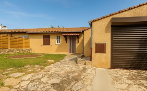 Plain-pied avec jardin et garage/Beau potentiel à moderniser !