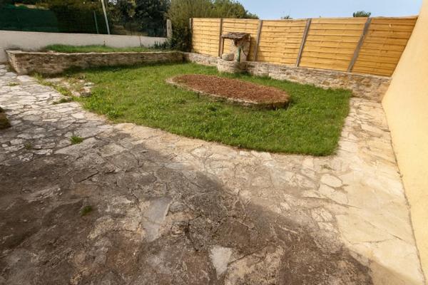 Plain-pied avec jardin et garage/Beau potentiel à moderniser !