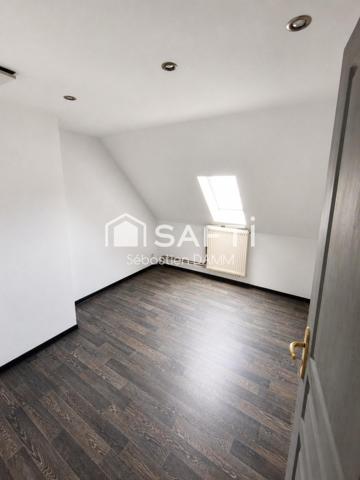 À vendre Mulhouse – Grande maison familiale avec jardin, garages et potentiel de division en 3 logements