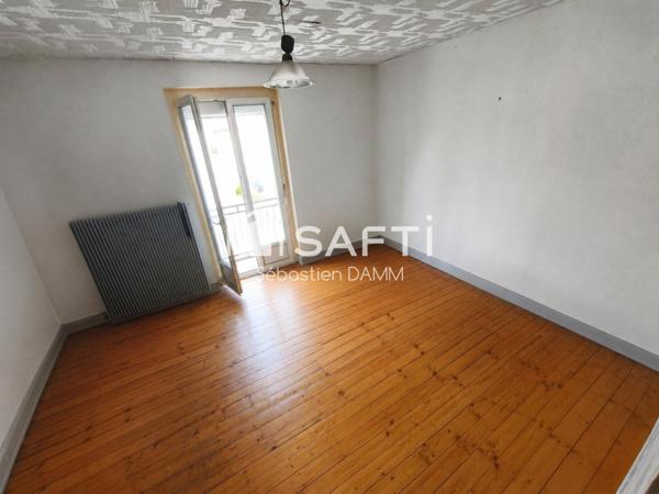 À vendre Mulhouse – Grande maison familiale avec jardin, garages et potentiel de division en 3 logements