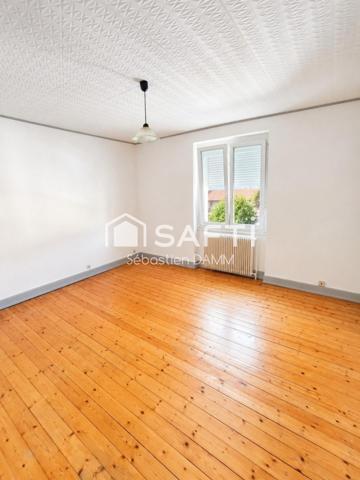 À vendre Mulhouse – Grande maison familiale avec jardin, garages et potentiel de division en 3 logements