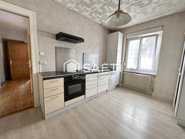 À vendre Mulhouse – Grande maison familiale avec jardin, garages et potentiel de division en 3 logements
