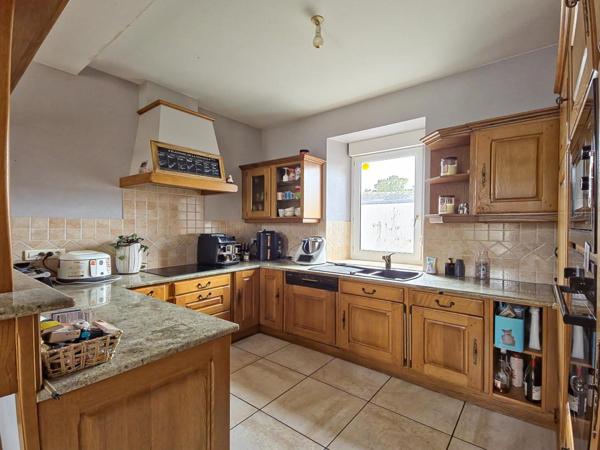 Immeuble mixte centre-bourg – murs commerciaux + logement