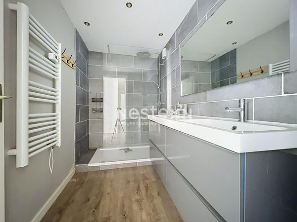 Appartement à vendre au centre ville de L'Isle Adam - 4 pièces avec garage fermé