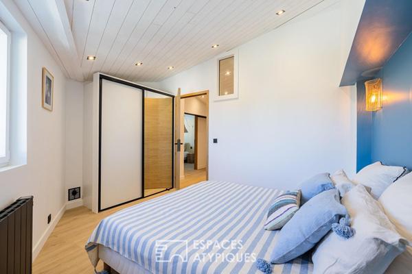 Ancienne épicerie devenue refuge de prestige près de la plage