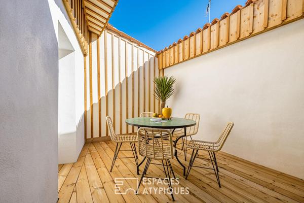 Ancienne épicerie devenue refuge de prestige près de la plage