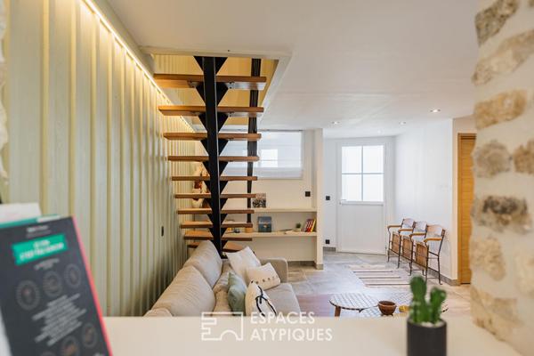 Ancienne épicerie devenue refuge de prestige près de la plage