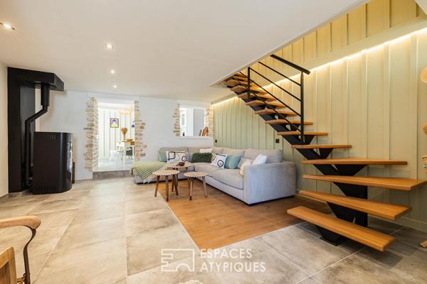 Ancienne épicerie devenue refuge de prestige près de la plage