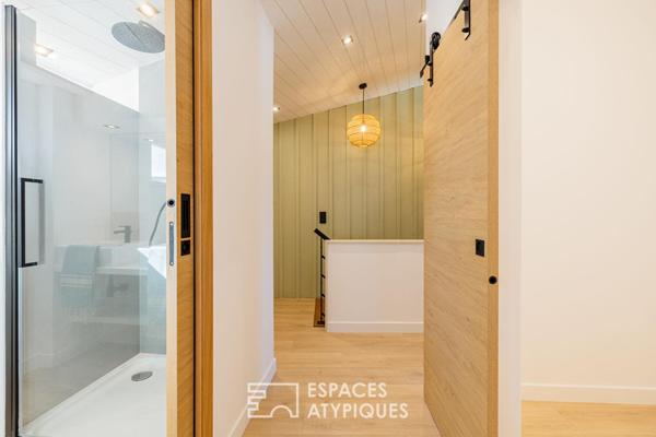 Ancienne épicerie devenue refuge de prestige près de la plage