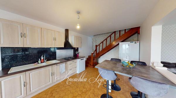 Maison 4 chambres - véranda et garage