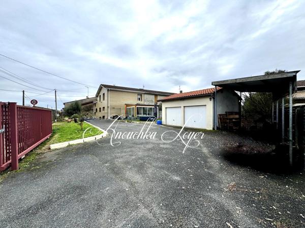 Maison 4 chambres - véranda et garage