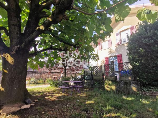 Maison de caractère avec jardin et garage