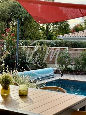 Maison à vendre à Lacanau- Neuve de plain-pied avec piscine et prestations modernes dans quartier résidentiel recherché de Lacanau Ville, proche lac et commodités LACANAU