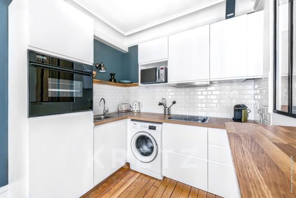 Élégant 2 pièces au charme parisien préservé