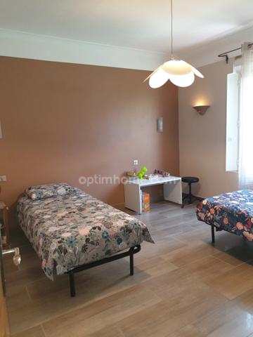 A Vendre : Élégante demeure des années 30 avec piscine, deux logements