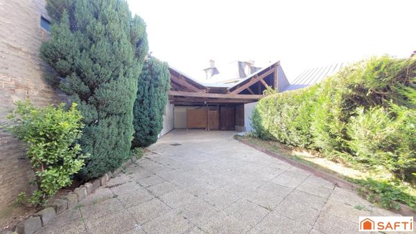 MAISON T6 de 143m² en CENTRE VILLE avec commodités de plain-pied, grande terrasse et accès véhicule