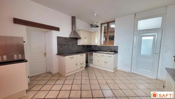 MAISON T6 de 143m² en CENTRE VILLE avec commodités de plain-pied, grande terrasse et accès véhicule