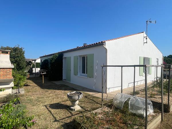 Maison 3 chambres avec véranda, garage et terrain de 578 m² - Environnement calme