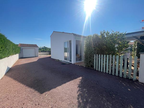 Maison 3 chambres avec véranda, garage et terrain de 578 m² - Environnement calme
