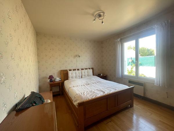 Maison 3 chambres avec véranda, garage et terrain de 578 m² - Environnement calme