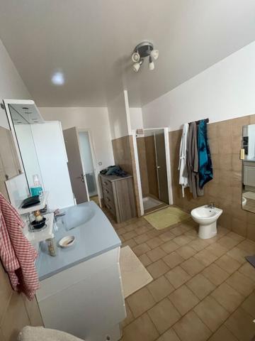 Maison 3 chambres avec véranda, garage et terrain de 578 m² - Environnement calme