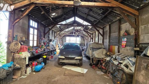 Maison de ville avec grand Hangar/atelier