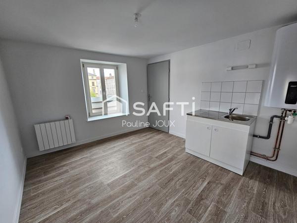 Immeuble avec local commercial et 2 appartements libres