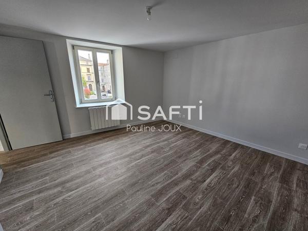 Immeuble avec local commercial et 2 appartements libres