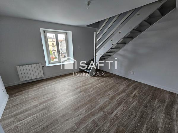 Immeuble avec local commercial et 2 appartements libres