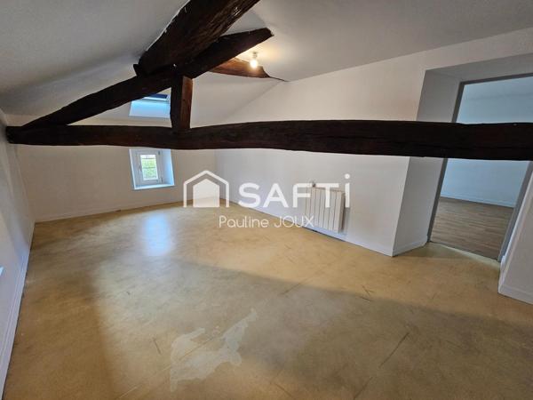 Immeuble avec local commercial et 2 appartements libres